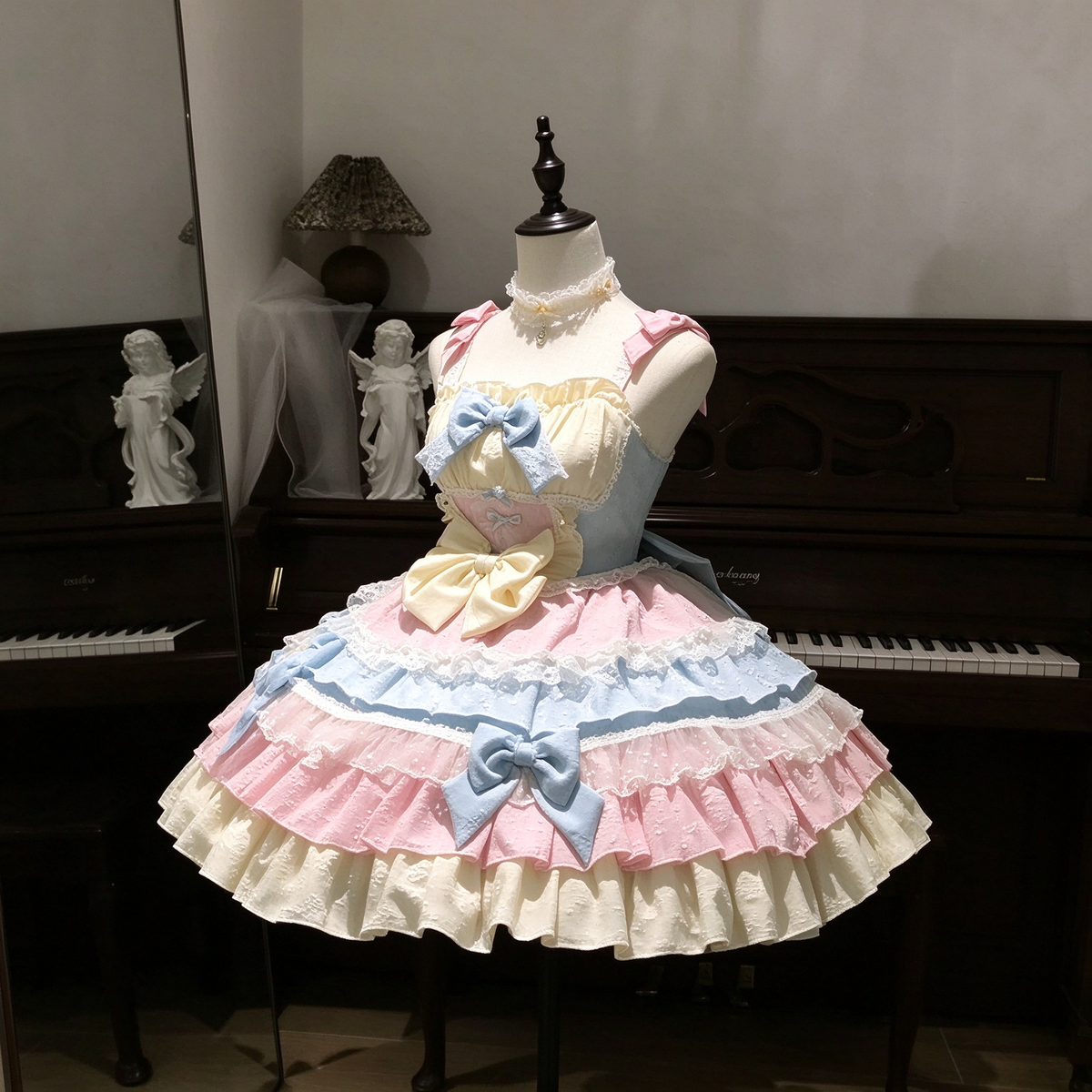 Pastel Pink and Blue Ruffled Lolita Dress with Train Bow Accent